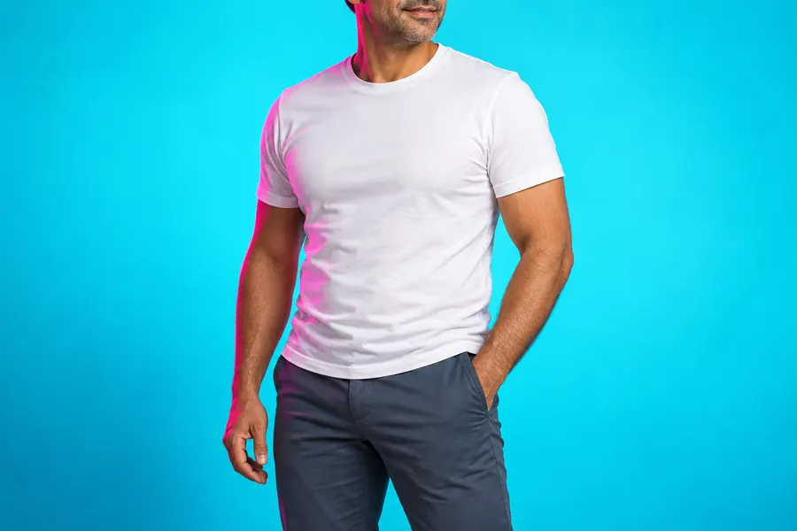 Power assisted liposuction guide: clothed adult male editorial model showing natural waist and torso proportions